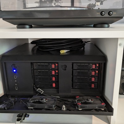 The case has terrible airflow through the backplane so I had to jerry-rig some noctua fans at the front.